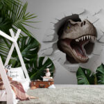 Fototapeta Dinosaurus se vynoří skrz prasklou zeď.